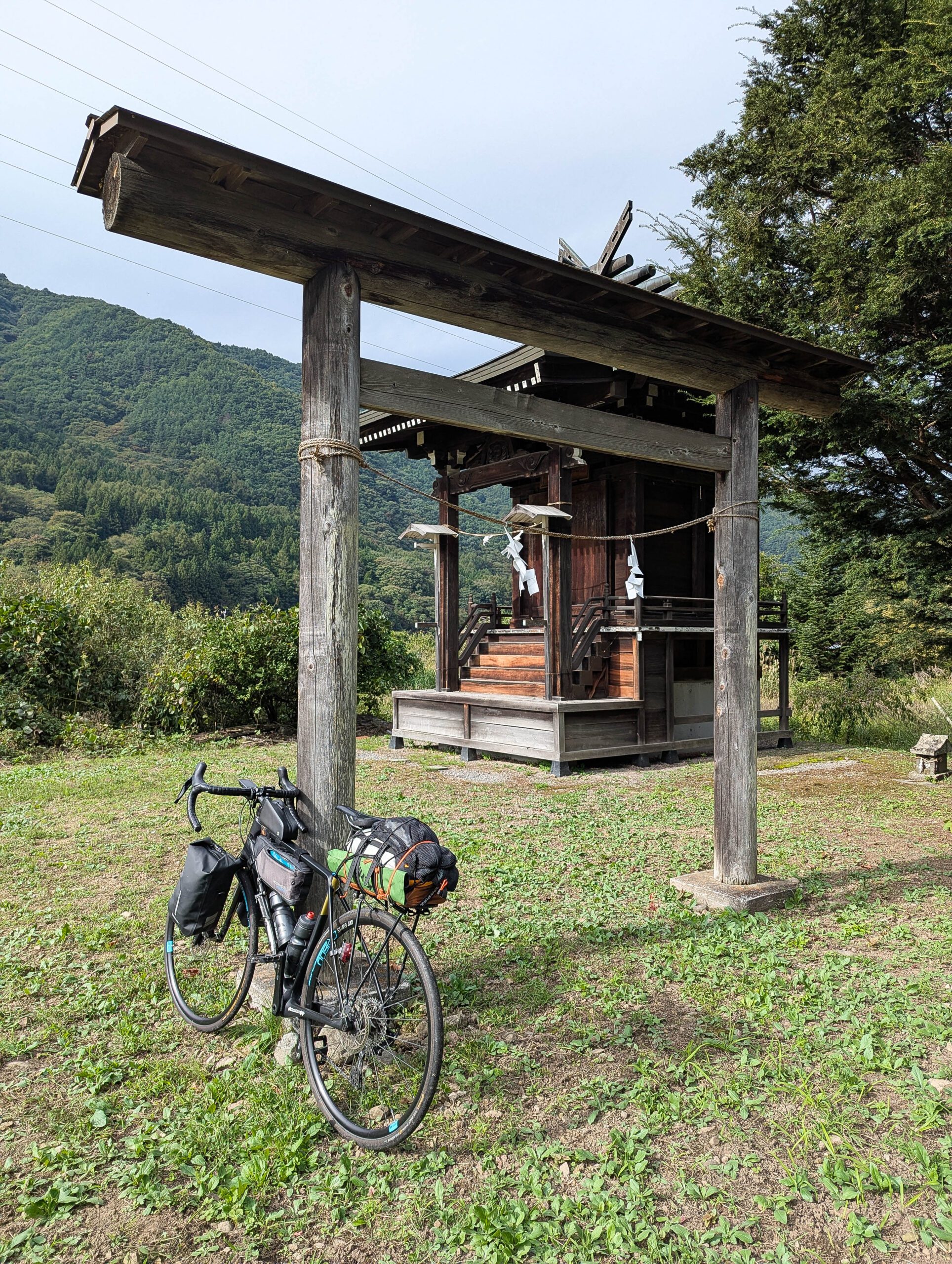 A secluded wooden temple in a countryside.
